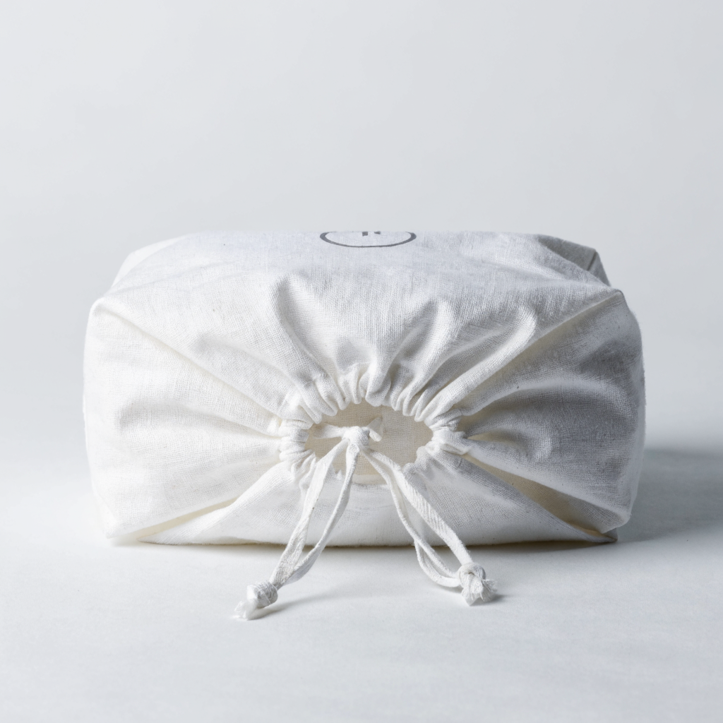 Sac de blanchisserie en coton blanc personnalisé, plié, avec cordon de serrage
